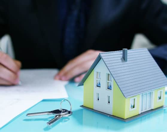 House Model Beside Keys — Property Lawyers In Central Coast, NSW