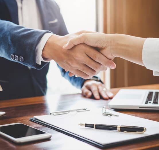 Business Man Handshaking — Property Lawyers In Central Coast, NSW