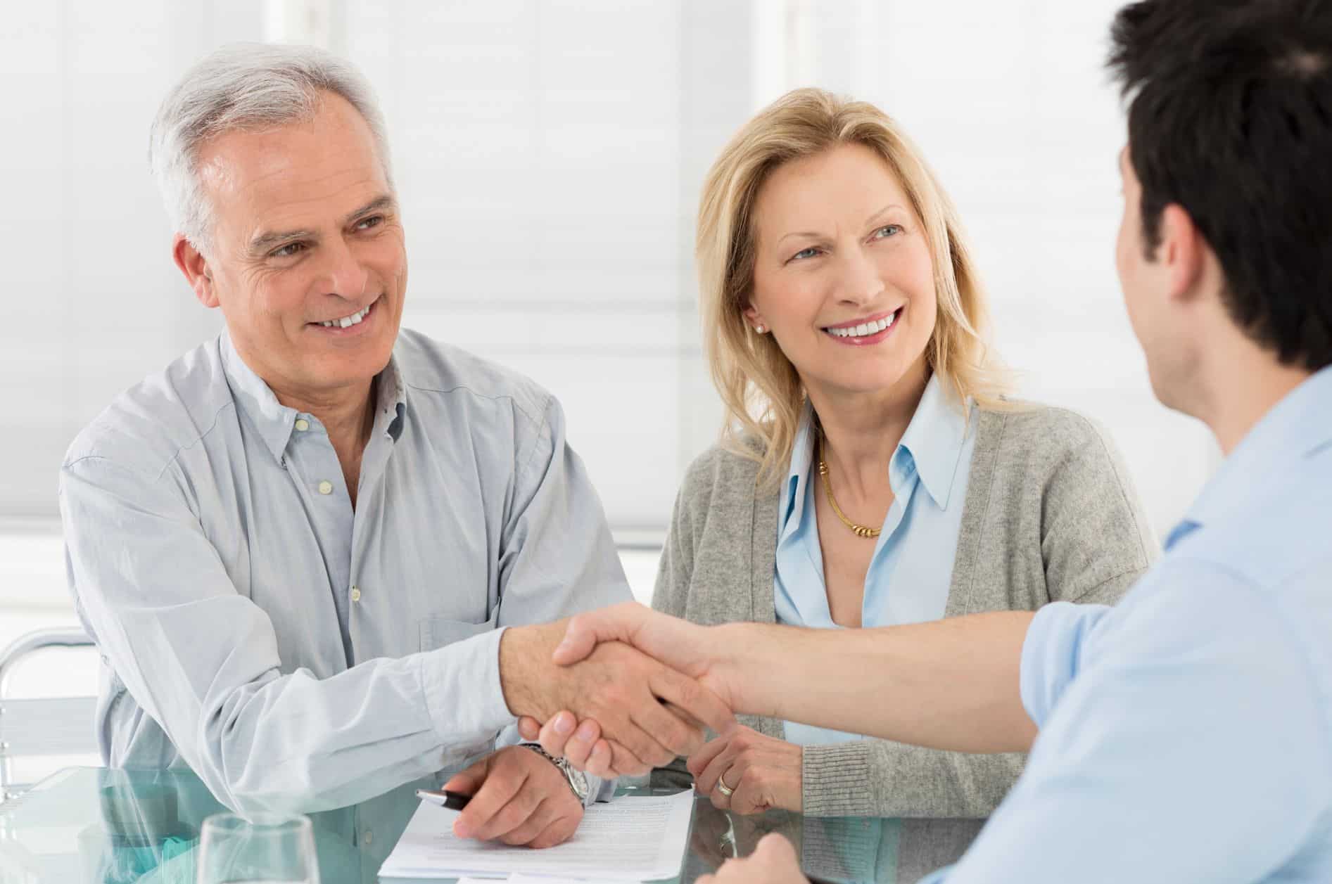 Middle Aged Couple Meeting With Conveyancer — Property Lawyers In Central Coast, NSW