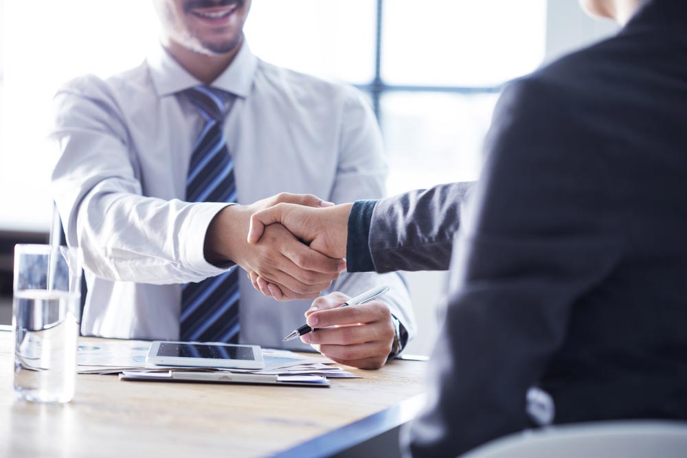 Shaking Hands With A Property Lawyer
