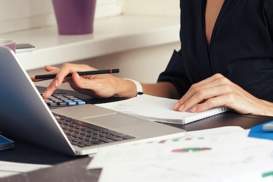 Woman With Laptop — Property Lawyers In Central Coast, NSW
